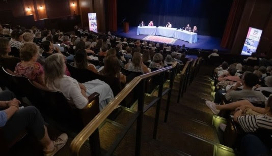 Women attending event at New Vic Theatre