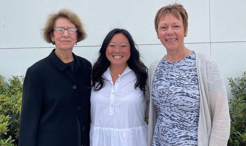 Research Committee Co-Chair Yonie Harris, Board Chair Jamie Dufek, and Research Committee Co-Chair Marita Hawryluk