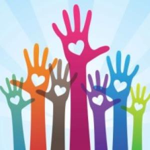 hands raised with hearts