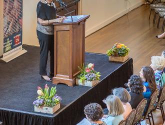 Sallie Coughlin gives introduction