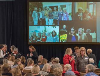 Audience watching slideshow