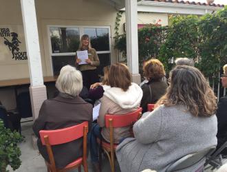 LuAnn Miller addresses visitors