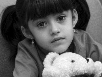 CASA Court Appointed Special Advocates: little girl with white teddy bear