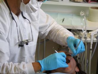 The Cecilia Fund: dentist with patient