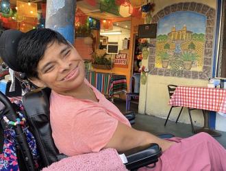 Hillside House resident in wheelchair