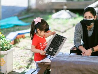 child with child care worker