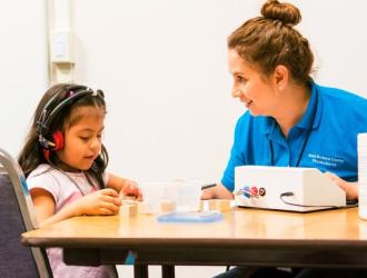 Speech therapist and child