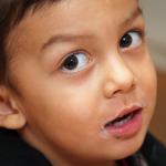 Storyteller Children's Center: little boy with milk "mustache"