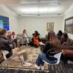 Group of adults sitting in a counseling room