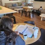 Teen works on homework in home